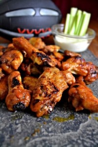 A great Game Day recipe for hot wings using cranberry sauce and sriracha.