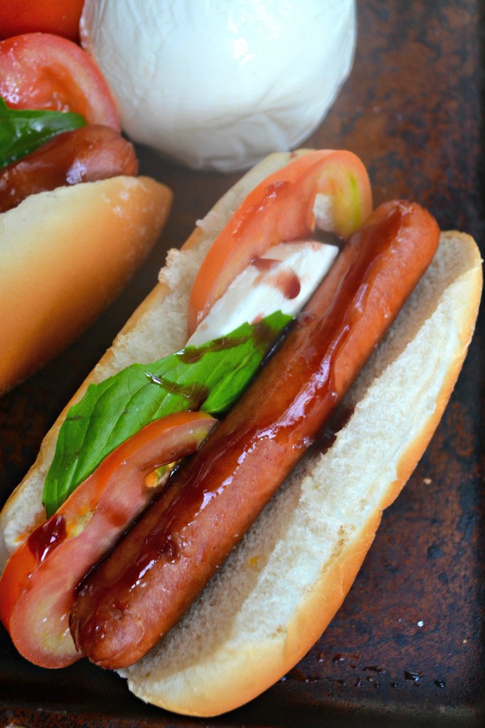 This is great twist on the usual hot dogs that we grill every summer. A blend of caprese salad and grilled hot dogs.