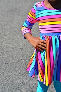 You can't go wrong with a colorful striped dress, especially on a little girl. Check out the dress this little fashionista is loving right now.