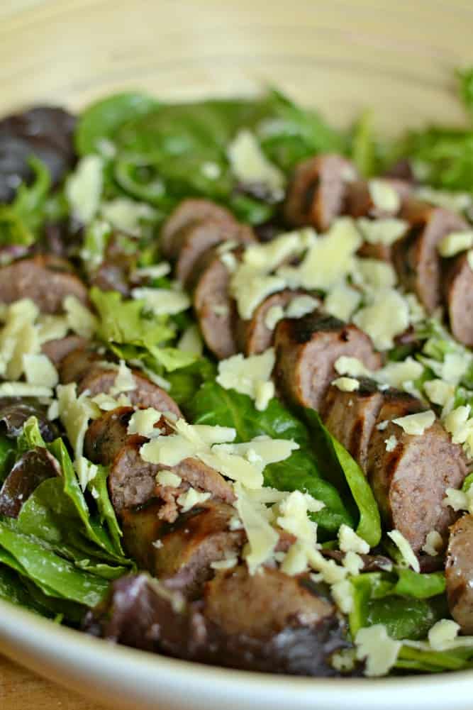 This Beer Bratwurst Salad is so easy! Perfect for grilling season, or a hearty and healthy weeknight meal. Use white cheddar to make it even more delicious.