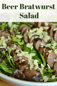This Beer Bratwurst Salad is so easy! Perfect for grilling season, or a hearty and healthy weeknight meal. Use white cheddar to make it even more delicious.
