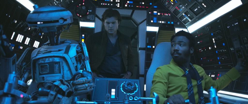 Alden Ehrenreich is Han Solo, Donal Glover is Lando Calrissian and Phoebe Waller-Bridge is L3-37 in SOLO: A STAR WARS STORY.