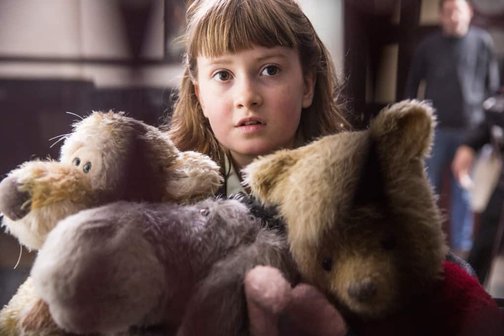 Madeline Robin (Bronte Carmichael) with her new friends Tigger, Eeyore and Pooh in Disney’s live-action adventure CHRISTOPHER ROBIN.