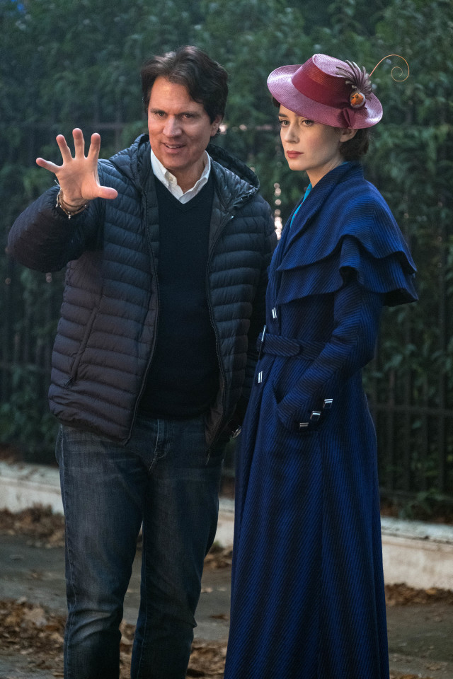Rob Marshall and Emily Blunt on the set of Disney’s MARY POPPINS RETURNS, a sequel to the 1964 film MARY POPPINS, which takes audiences on an entirely new adventure with the practically perfect nanny and the Banks family.