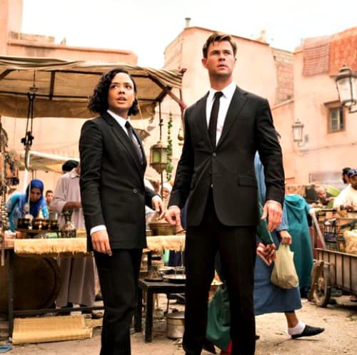This Men In Black International review shares a parent's honest opinion about not taking young kids to see the film, and why PG-13 is the right rating.