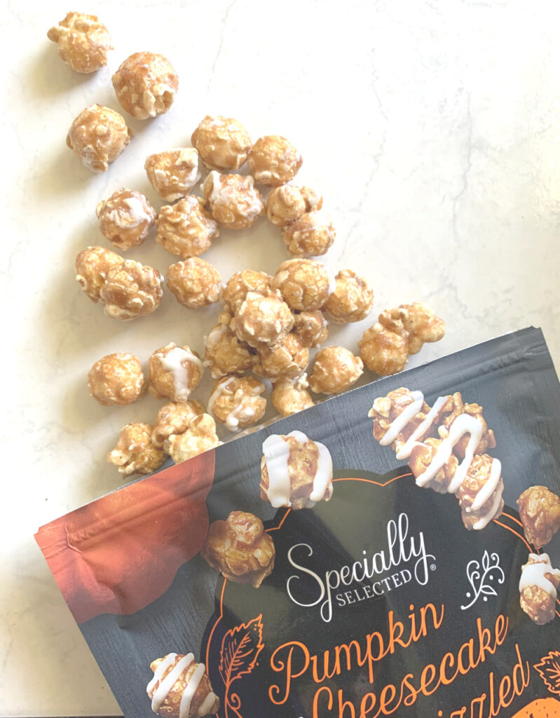 They did it again! The ALDI Pumpkin Spice Popcorn is in stores, and causing trouble. See why you need to add it to your cart today.