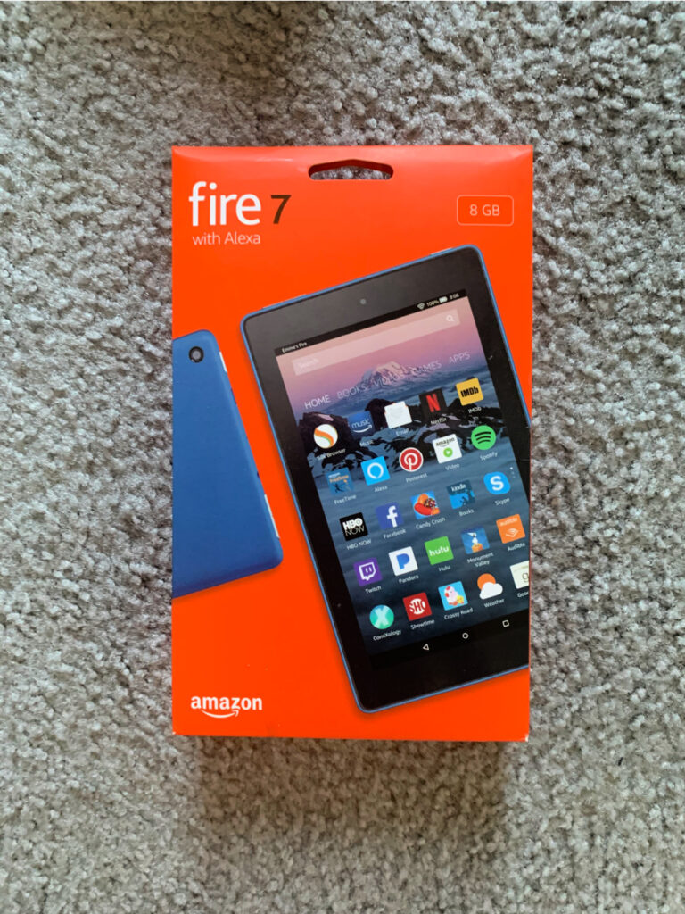 Photo of a kindle fire 7 on a grey carpet